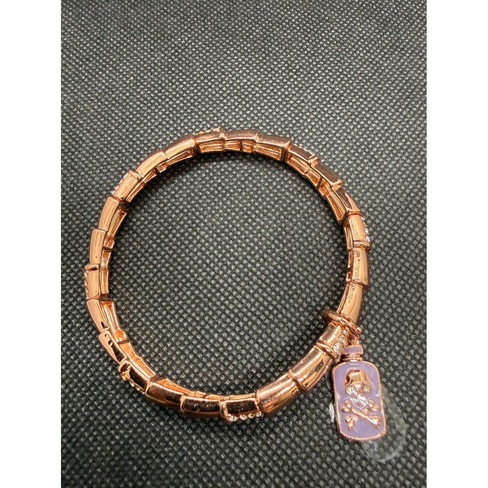 BP. Rose Gold Tone Bamboo Stretch Bracelet Lavender Skull Crossbones Charm